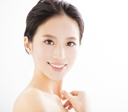 closeup beautiful young smiling  woman  faceの写真素材