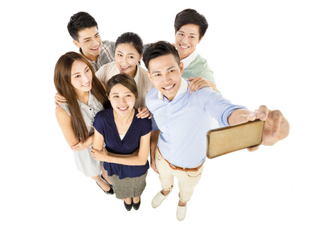top view of happy young group Taking Selfieの写真素材
