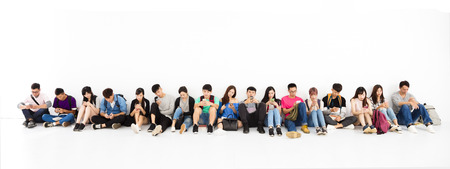 young student Group watching smart phoneの写真素材