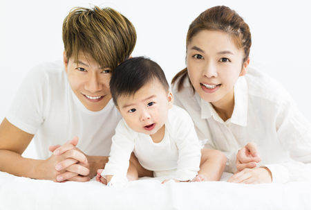 happy young asian family with sweet baby boyの写真素材