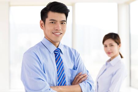 Young Business people standing in officeの写真素材