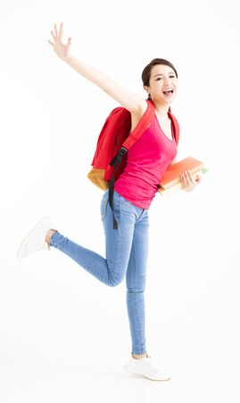 Full length portrait of happy smiling female student の写真素材