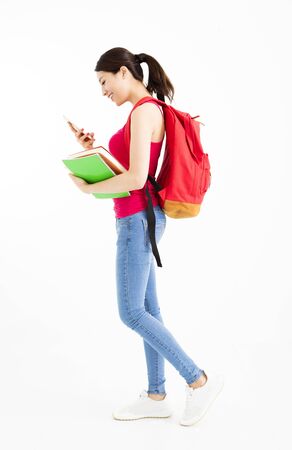 Happy university student with mobile phoneの写真素材