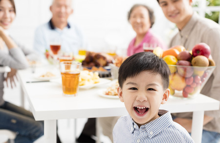 happy asian family having dinnerÂ at homeの写真素材