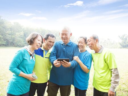 Group of seniors watching the smart phone