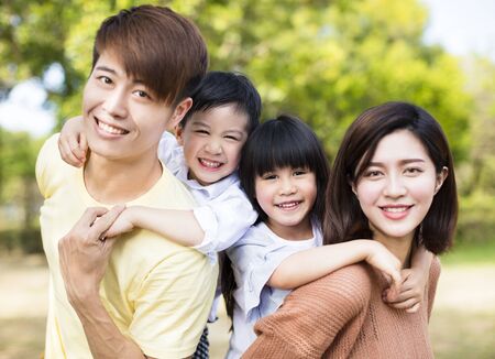 Portrait Of Happy asian Family InÂ the park
の写真素材