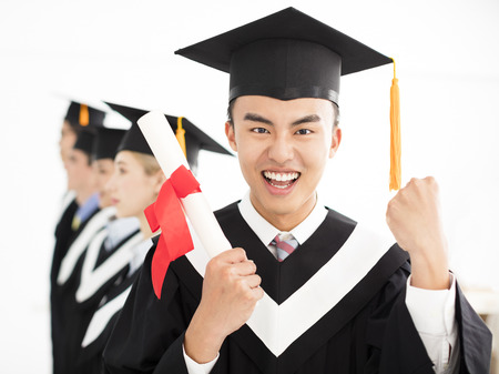 happy college graduate at graduation with classmates
の写真素材