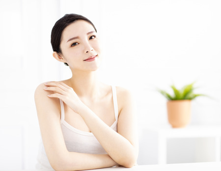 Beautiful young woman with clean perfect skinの写真素材