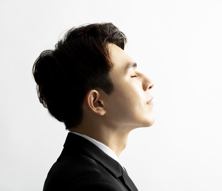 Side view of young handsome man faceの写真素材