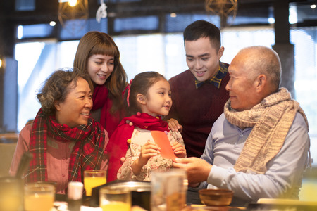 happy asian family having dinner and celebrating chinese new yearの写真素材