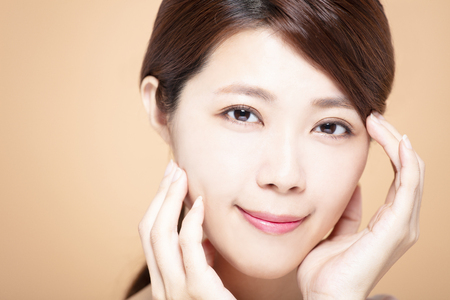 young woman with natural makeup and clean skinの写真素材
