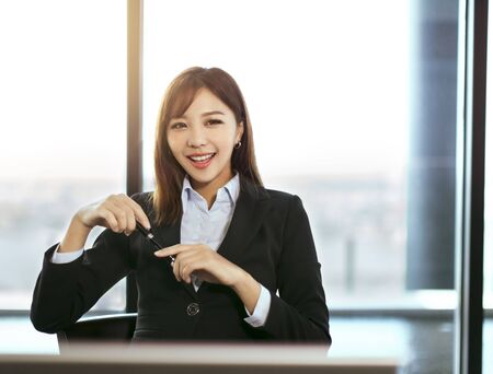 young beautiful business woman working in officeの写真素材