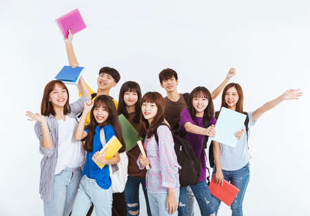 young student group wearing protective medical face masks standing together with stop gestureの写真素材