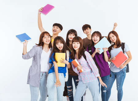 young student group wearing protective medical face masks standing together with stop gestureの写真素材