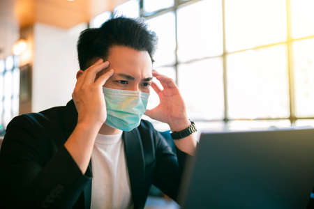 young Business man Working and study In Coffee Shopの写真素材
