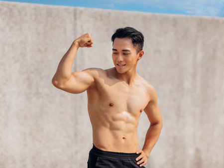 Fitness man exercising sit ups and crunchesの写真素材