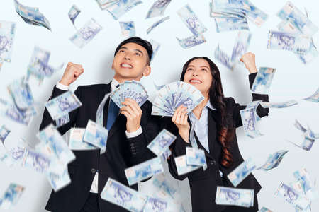 Business man and woman working together in officeの写真素材