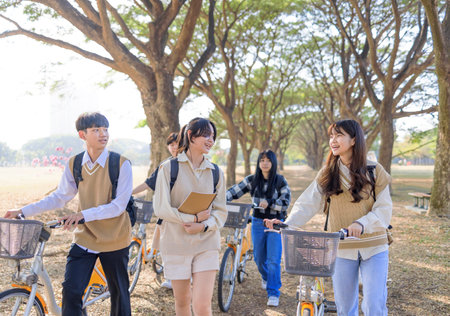 Happy students walking together in the park