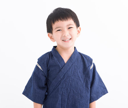Happy Asian Kid wearing kimono japanese clothesの写真素材