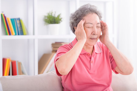 Senior woman suffering from a headacheの写真素材