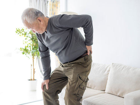 senior man with pain in backの写真素材
