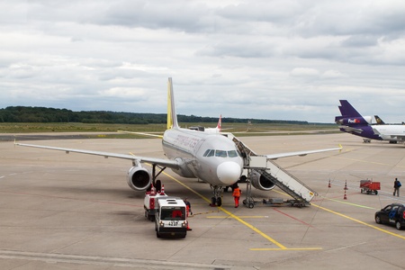 COLOGNE - JUNE 13: Germanwings GmbH is a low-cost airline based in Cologne, Germany. Embarkation of Germanwings' airplane in June 13, 2011, Cologne, Germany. のeditorial素材