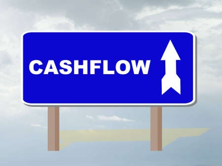 roadsign showing direction to cashflowの写真素材