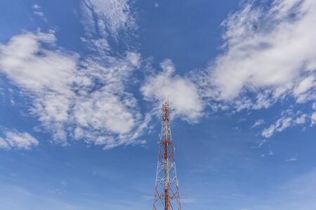 Pole for distributing signals to communicate a blue sky backgroundの写真素材