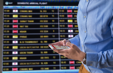 booking online to travel  and working on mobileの写真素材