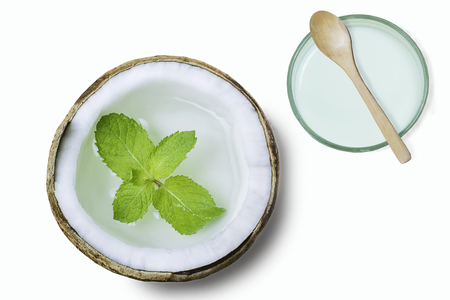 Coconut. Half isolated on white background. Top view. and treatmentsの写真素材