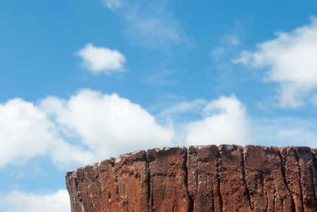 stucco background blue sky with white clouds.の写真素材