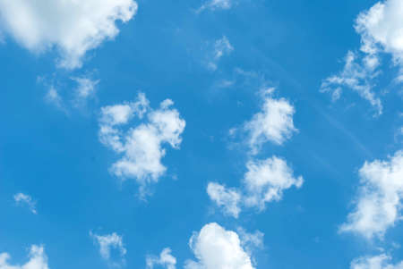 blue sky background with white cloudsの写真素材
