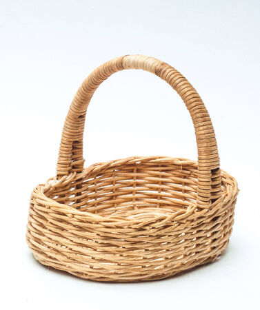vintage weave wicker basket isolated on white の写真素材
