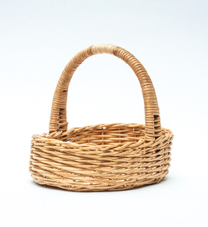 vintage weave wicker basket isolated on white の写真素材