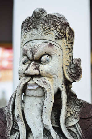 Statue at Wat Pho, Bangkok( Art in a temple in Thailand, there is no copyright notice)の写真素材