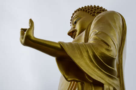 The big Buddha image is located along the Mekong River.の写真素材