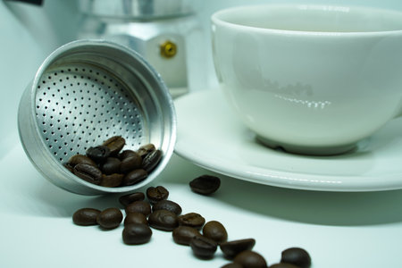 Hot black coffee in a white cup,coffee is a popular beverage all over the world.の写真素材