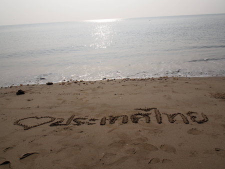 Thai letters, I love Thailand, on beachの写真素材