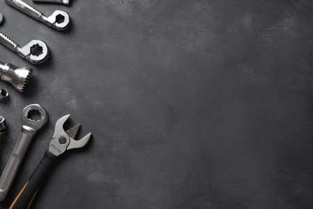 Set of tools on black background, top view. Space for textの素材