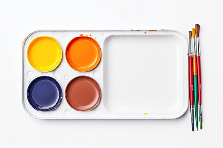 Watercolor paints and brushes isolated on white background. Top view.の素材