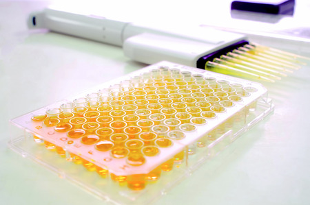 A microtitre plate  spelled microtiter