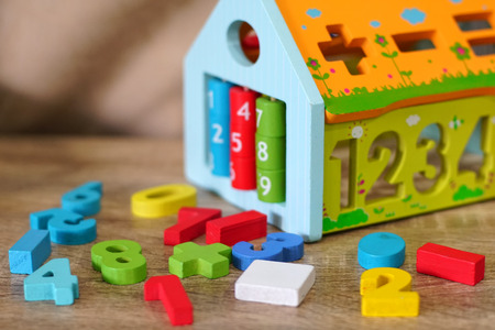 Colorful wooden toys in playroomの写真素材