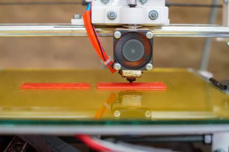 Electronic three dimensional plastic printer during work in school laboratory