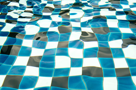 swimming pool ripple and flow with waves backgroundの写真素材