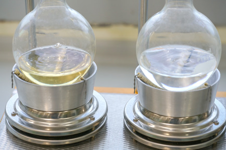 Soxhlet Extractor.Percolator-boiler and reflux,distillation flask on heating element.Organic...