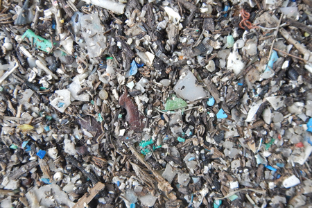 Micro plastics marine debris on the sand beach.の写真素材