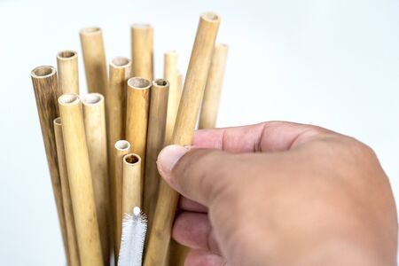 Nature drinking straws from bamboo wood for reusable and reduce the use of plastic straw. Reduce plastic waste in environment.の写真素材