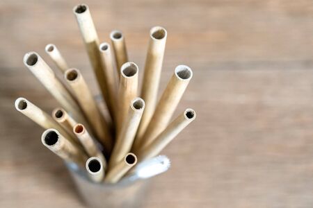 Nature drinking straws from bamboo wood for reusable and reduce the use of plastic straw. Reduce plastic waste in environment.の写真素材