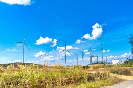 Wind turbines generating electricity with blue sky,renewable energy source.の写真素材