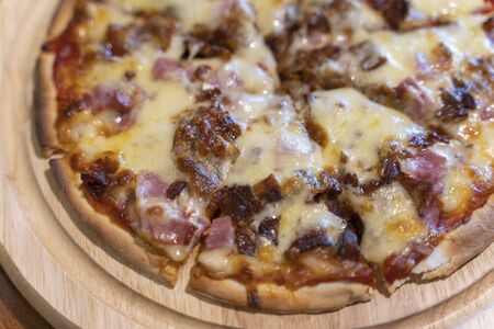 Hot homemade barbecue chicken pizza with onions and cheese and mushrooms.の写真素材